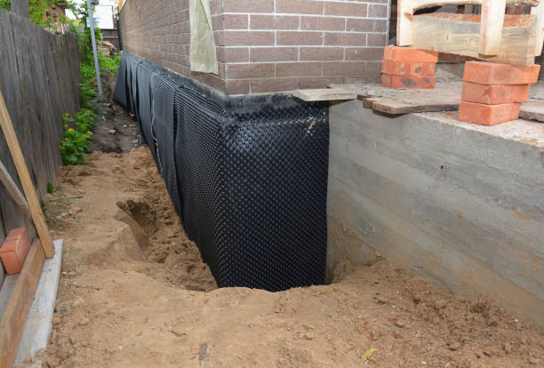 SJ Waterproofing Pros technician performing targeted Emergency Waterproofing assessment in Pelham, GA